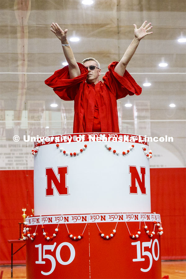 Chancellor Ronnie Green wearing the robe of the Innocents pops out of the N150 birthday cake. Showtime at the Coliseum performances as part of Homecoming week. September 30, 2019. Photo by Craig Chandler / University Communication.